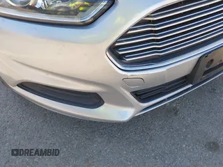 2014 Ford Fusion SE with VIN 3FA6P0H76ER127534, listed as a IAAI auction lot 42097749 with 127,863 mi miles. Bid and sale history available at carsss.com. Image 6.