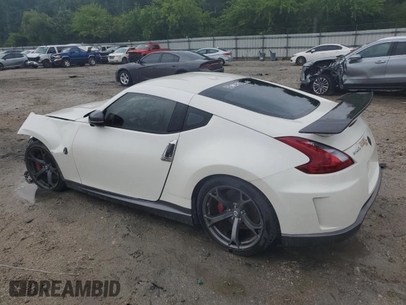 2014 Nissan 370Z with VIN JN1AZ4EH2EM633845, listed as a Copart auction lot 63583194 with 0 mi miles and Salvage Title. Bid and sale history available at carsss.com. Image 2.