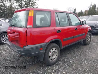 1998 Honda CR-V LX with VIN JHLRD1849WC034392, listed as a IAAI auction lot 41710053 with 126,120 mi miles. Bid and sale history available at carsss.com. Image 4.