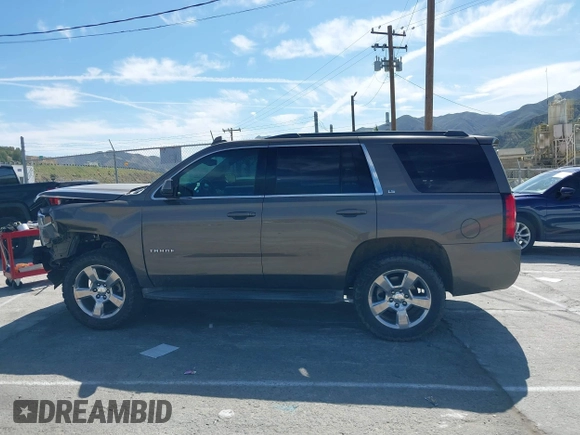 2016 Chevrolet Tahoe LS with VIN 1GNSCAKC7GR419294, listed as a IAAI auction lot 42020006 with 83,945 mi miles and . Bid and sale history available at DreamBid. Image 14.