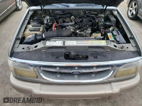 1999 Ford Explorer XL z VIN 1FMDU32E9XZB67958, wystawiony jako Copart lot #75350694 z przebiegiem 202 939 mil mil oraz Szkoda całkowita • Salvage title. Historia ofert i sprzedaży dostępna na DreamBid. Obrazek 12.
