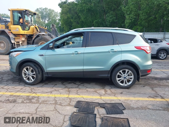 2013 Ford Escape Titanium with VIN 1FMCU9J99DUD63037, listed as a IAAI auction lot 42436605 with 168,200 mi miles and . Bid and sale history available at DreamBid. Image 14.