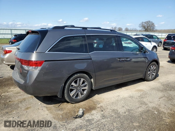 2017 Honda Odyssey Touring with VIN 5FNRL5H91HB013660, listed as a Copart auction lot 54246815 with 79,501 mi miles and Clean title. Bid and sale history available at DreamBid. Image 3.