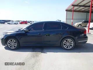 2019 Volkswagen Passat 2.0T Wolfsburg Edition with VIN 1VWLA7A30KC009646, listed as a IAAI auction lot 39842320 with 101,006 mi miles. Bid and sale history available at carsss.com. Image 15.