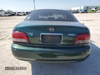 1999 Mazda 626 ES with VIN 1YVGF22C1X5896686, listed as a Copart auction lot 72012584 with 123,672 mi miles and Salvage Title. Bid and sale history available at carsss.com. Image 6.