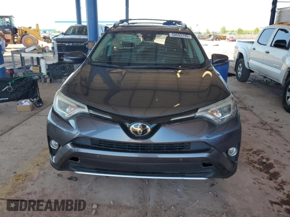 2016 Toyota RAV4 Limited z VIN 2T3YFREV9GW293588, wystawiony jako Copart lot #59593795 z przebiegiem 92 102 mil mil oraz Szkoda całkowita • Salvage title. Historia ofert i sprzedaży dostępna na DreamBid. Obrazek 5.