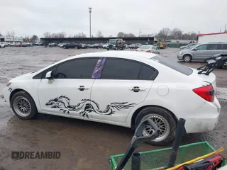 2012 Honda Civic EX-L with VIN 2HGFB2F95CH529693, listed as a IAAI auction lot 41160120 with 194,418 mi miles and . Bid and sale history available at DreamBid. Image 14.