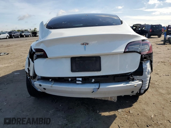 2023 Tesla Model 3 с VIN 5YJ3E1EA6PF427300, выставлен на аукционе Copart как лот 61457055 с пробегом 44 438 миль миль и Списание • Salvage title. История ставок и продаж доступна на DreamBid. Изображение 6.