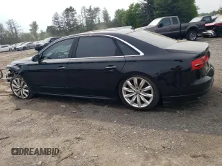 2017 Audi A8 Sport z VIN WAU43AFD4HN007229, wystawiony jako Copart lot #56946985 z przebiegiem Nie podano mil oraz Tytuł czysty. Historia ofert i sprzedaży dostępna na DreamBid. Obrazek 2.