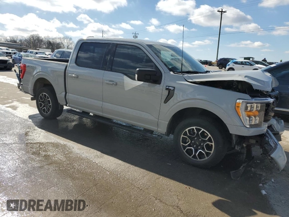 2023 Ford F-150 XL with VIN 1FTEW1CP4PKD26319, listed as a Copart auction lot 43797415 with 25,895 mi miles and Salvage Title. Bid and sale history available at DreamBid. Image 4.