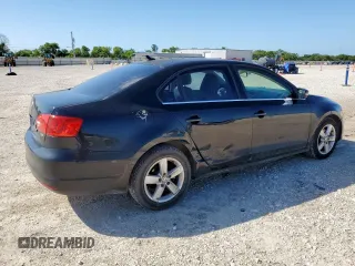 2013 Volkswagen Jetta TDI w/Premium z VIN 3VWLL7AJ7DM232096, wystawiony jako Copart lot #57265725 z przebiegiem 120 361 mil mil oraz Szkoda całkowita • Salvage title. Historia ofert i sprzedaży dostępna na DreamBid. Obrazek 3.