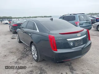 2017 Cadillac XTS Luxury with VIN 2G61M5S35H9143656, listed as a IAAI auction lot 41929023 with 141,033 mi miles and . Bid and sale history available at DreamBid. Image 3.