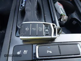 2018 Genesis G80 3.8L z VIN KMHGN4JE7JU262623, wystawiony jako IAAI lot #41230215 z przebiegiem 94 006 mil mil oraz . Historia ofert i sprzedaży dostępna na DreamBid. Obrazek 11.
