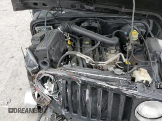 2000 Jeep Wrangler Sport with VIN 1J4FA49S9YP743515, listed as a Copart auction lot 53906305 with 247,349 mi miles and Salvage title. Bid and sale history available at DreamBid. Image 12.