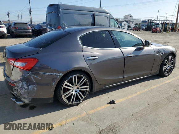 2016 Maserati Ghibli S Q4 z VIN ZAM57RTA8G1173582, wystawiony jako Copart lot #48792615 z przebiegiem Nie podano mil oraz Szkoda całkowita • Salvage title. Historia ofert i sprzedaży dostępna na DreamBid. Obrazek 3.