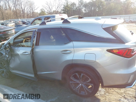 2018 Lexus RX 350L Premium with VIN JTJGZKCA4J2006200, listed as a IAAI auction lot 41781149 with 119,021 mi miles and . Bid and sale history available at DreamBid. Image 14.