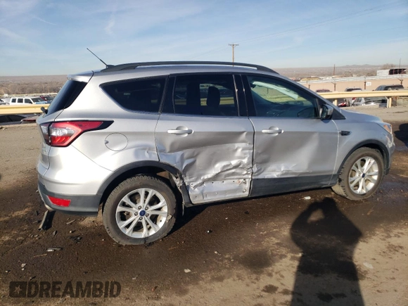 2018 Ford Escape SE with VIN 1FMCU0G96JUC38690, listed as a Copart auction lot 86504514 with 90,811 mi miles and Salvage Title. Bid and sale history available at carsss.com. Image 3.