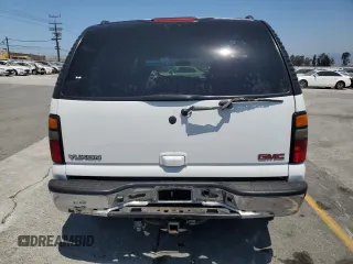 2005 GMC Yukon SLT z VIN 1GKEC13V65J174655, wystawiony jako Copart lot #59050755 z przebiegiem 93 893 mil mil oraz Czysty tytuł • Clean title. Historia ofert i sprzedaży dostępna na DreamBid. Obrazek 6.