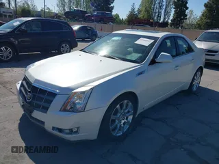 2008 Cadillac CTS RWD z VIN 1G6DV57V280142396, wystawiony jako IAAI lot #42086055 z przebiegiem 183 113 mil mil oraz . Historia ofert i sprzedaży dostępna na DreamBid. Obrazek 6.