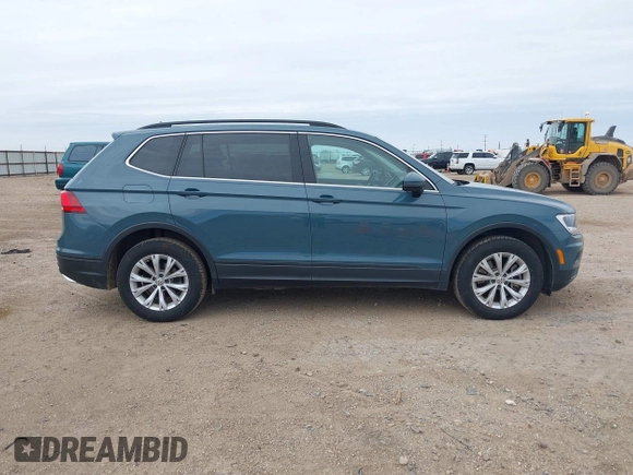 2019 Volkswagen Tiguan SE with VIN 3VV3B7AX3KM139472, listed as a IAAI auction lot 41674213 with 47,990 mi miles and . Bid and sale history available at DreamBid. Image 14.