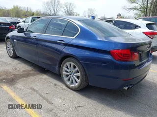 2013 BMW 5 Series 528i xDrive with VIN WBAXH5C52DD107297, listed as a IAAI auction lot 42004619 with 182,805 mi miles. Bid and sale history available at carsss.com. Image 3.
