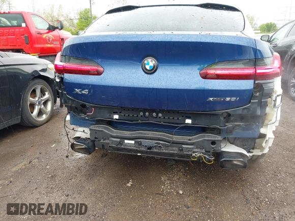 2023 BMW X4 xDrive30i z VIN 5UX33DT01P9P86340, wystawiony jako IAAI lot #42113558 z przebiegiem 27 226 mil mil oraz . Historia ofert i sprzedaży dostępna na DreamBid. Obrazek 6.