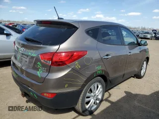 2010 Hyundai Tucson GLS with VIN KM8JU3AC8AU056499, listed as a Copart auction lot 53057365 with 119,906 mi miles and Salvage Title. Bid and sale history available at DreamBid. Image 3.