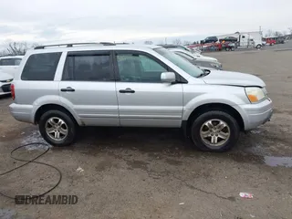2005 Honda Pilot EX with VIN 5FNYF18455B064378, listed as a IAAI auction lot 41684465 with 248,225 mi miles and . Bid and sale history available at DreamBid. Image 14.