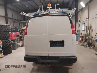 2015 Chevrolet Express Cargo Van with VIN 1GCWGFCF9F1167677, listed as a IAAI auction lot 42018087 with 148,263 mi miles. Bid and sale history available at carsss.com. Image 16.