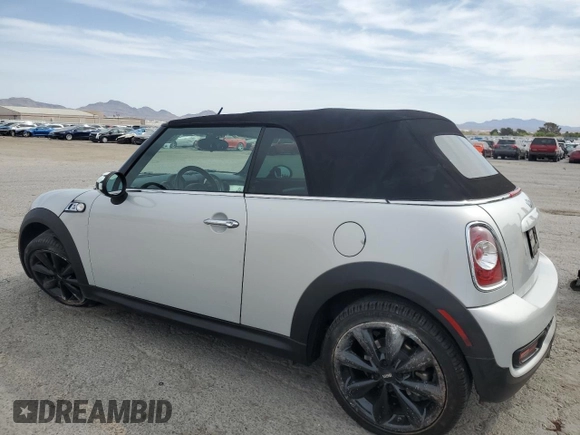2014 MINI Convertible S with VIN WMWZP3C53ET707205, listed as a Copart auction lot 52179175 with 101,209 mi miles and Salvage Title. Bid and sale history available at DreamBid. Image 2.