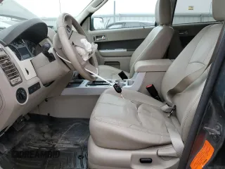 2010 Mercury Mariner Premier with VIN 4M2CN9HGXAKJ19825, listed as a Copart auction lot 44738925 with 147,657 mi miles and Salvage title. Bid and sale history available at DreamBid. Image 7.
