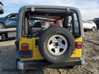 2001 Jeep Wrangler Sport with VIN 1J4FA49S21P312522, listed as a Copart auction lot 54698935 with 201,199 mi miles and Salvage Title. Bid and sale history available at carsss.com. Image 6.
