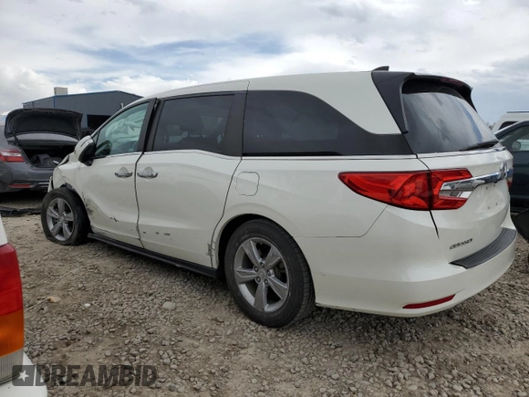 2018 Honda Odyssey EX-L with VIN 5FNRL6H71JB059936, listed as a Copart auction lot 53403635 with 94,745 mi miles and Salvage Title. Bid and sale history available at DreamBid. Image 2.