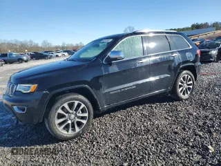 2017 Jeep Grand Cherokee Overland z VIN 1C4RJFCG9HC663433, wystawiony jako Copart lot #49231665 z przebiegiem 171 721 mil mil oraz Szkody całkowita. Historia ofert i sprzedaży dostępna na DreamBid. Obrazek 1.