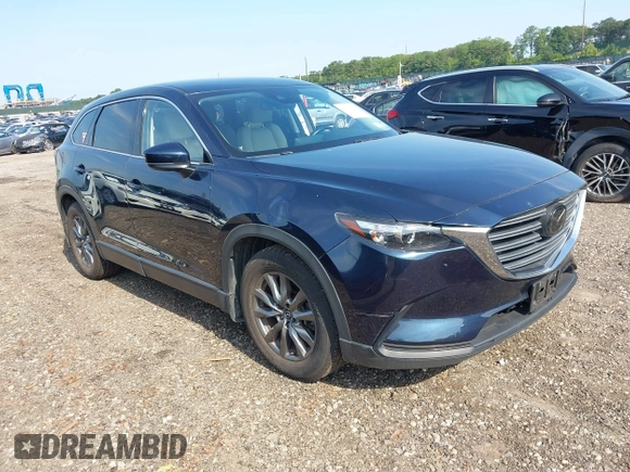 2021 Mazda CX-9 Touring with VIN JM3TCBCY7M0507699, listed as a IAAI auction lot 42603614 with 62,635 mi miles and . Bid and sale history available at DreamBid. Image 1.