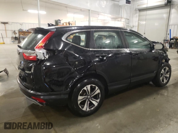 2017 Honda CR-V LX with VIN 5J6RW6H38HL004499, listed as a Copart auction lot 52412155 with 134,715 mi miles and Salvage Title. Bid and sale history available at DreamBid. Image 3.