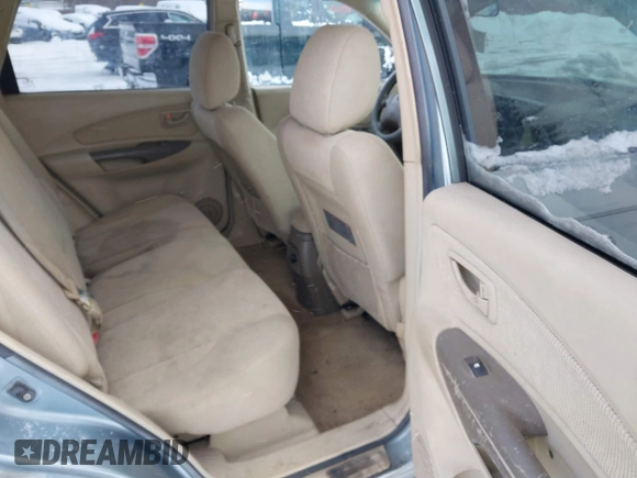 2006 Hyundai Tucson GL with VIN KM8JM72B06U298904, listed as a IAAI auction lot 41370728 with 209,284 mi miles. Bid and sale history available at carsss.com. Image 8.