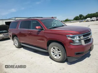2016 Chevrolet Suburban LT with VIN 1GNSKHKC0GR342361, listed as a Copart auction lot 56757655 with 261,015 mi miles and Clean Title. Bid and sale history available at DreamBid. Image 4.
