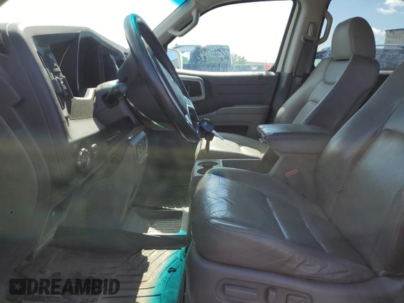2010 Honda Ridgeline RTL с VIN 5FPYK1F5XAB503311, выставлен на аукционе Copart как лот 66803485 с пробегом 197 985 миль миль и Чистый • Clean title. История ставок и продаж доступна на DreamBid. Изображение 7.