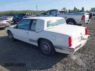 1989 Cadillac Eldorado with VIN 1G6EL1150KU621587, listed as a IAAI auction lot 42103841 with 129,711 mi miles and . Bid and sale history available at DreamBid. Image 3.