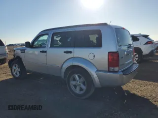 2010 Dodge Nitro SXT z VIN 1D4PT5GK5AW106990, wystawiony jako Copart lot #88719415 z przebiegiem 193 019 mil mil oraz Szkoda całkowita • Salvage title. Historia ofert i sprzedaży dostępna na DreamBid. Obrazek 2.