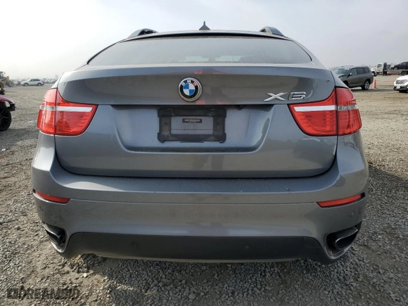 2012 BMW X6 50i with VIN 5UXFG8C53CL590367, listed as a Copart auction lot 86650664 with 0 mi miles and Salvage Title. Bid and sale history available at carsss.com. Image 6.