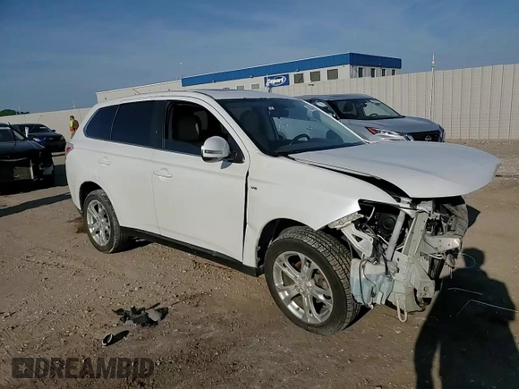 2014 Mitsubishi Outlander GT z VIN JA4JZ4AXXEZ010822, wystawiony jako Copart lot #60328445 z przebiegiem Nie podano mil oraz Szkoda całkowita • Salvage title. Historia ofert i sprzedaży dostępna na DreamBid. Obrazek 14.
