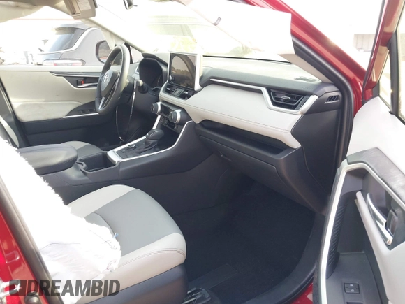 2023 Toyota RAV4 Hybrid XLE Premium z VIN JTMB6RFV8PD114927, wystawiony jako IAAI lot #41844127 z przebiegiem 14 582 mil mil oraz . Historia ofert i sprzedaży dostępna na DreamBid. Obrazek 5.