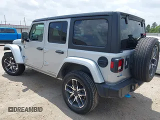 2024 Jeep Wrangler Sport S with VIN 1C4RJXN60RW208013, listed as a IAAI auction lot 42117388 with 34,407 mi miles and . Bid and sale history available at DreamBid. Image 3.