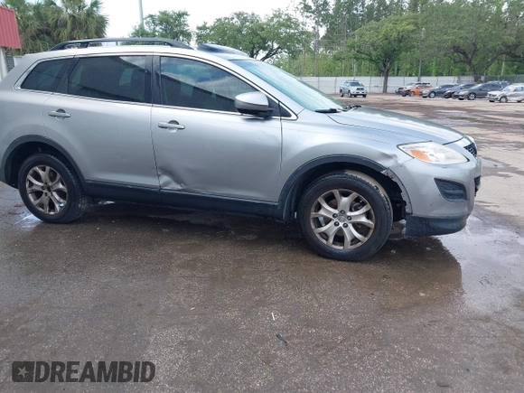 2012 Mazda CX-9 Touring with VIN JM3TB2CA3C0334249, listed as a IAAI auction lot 42092647 with 240,890 mi miles and . Bid and sale history available at carsss.com. Image 6.