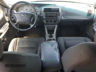 2001 Ford Explorer Sport Trac с VIN 1FMZU67E81UB99076, выставлен на аукционе Copart как лот 62218565 с пробегом 213 872 миль миль и Чистый • Clean title. История ставок и продаж доступна на DreamBid. Изображение 8.