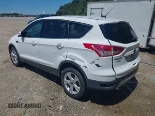 2014 Ford Escape SE with VIN 1FMCU9G90EUB76911, listed as a IAAI auction lot 42143518 with 123,466 mi miles and . Bid and sale history available at DreamBid. Image 3.
