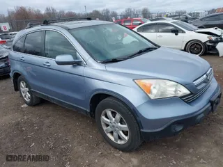 2007 Honda CR-V EX-L with VIN JHLRE48737C078883, listed as a IAAI auction lot 41923822 with 113,256 mi miles. Bid and sale history available at carsss.com. Image 1.