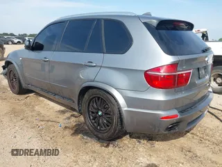 2012 BMW X5 50i with VIN 5UXZV8C56CL426081, listed as a IAAI auction lot 42084071 with 135,473 mi miles and . Bid and sale history available at DreamBid. Image 3.